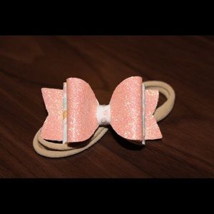 Small double layer peach glitter bow on nylon!